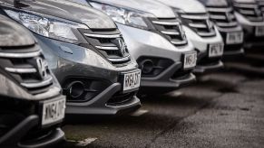 A row of Honda cars at a dealership