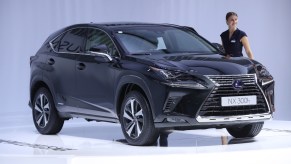 A new Lexus NX 300h on display at an auto show