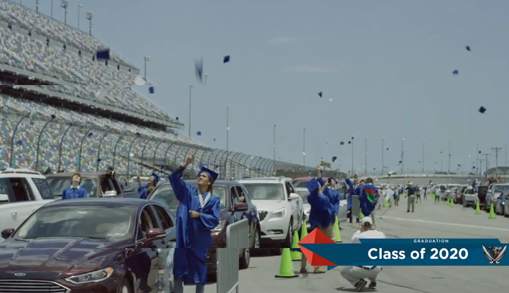 Students toss the graduation caps in celebration of graduating