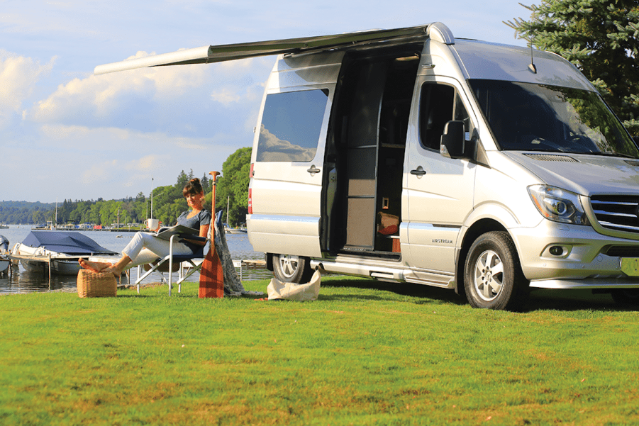 The 2019 Airstream Interstate 19 model camped out on a soft grassy plain