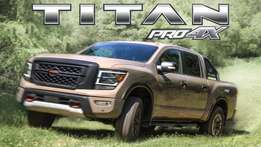 Tan 2020 Nissan Titan Pro-4X driving through a forest