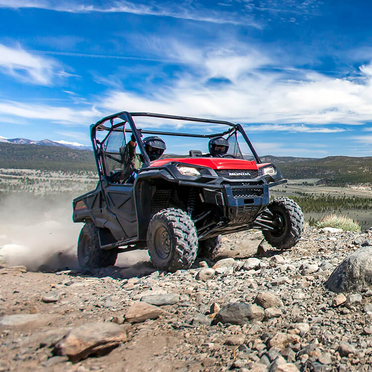 A Honda UTV do what it does best, going cross country over rough terrain