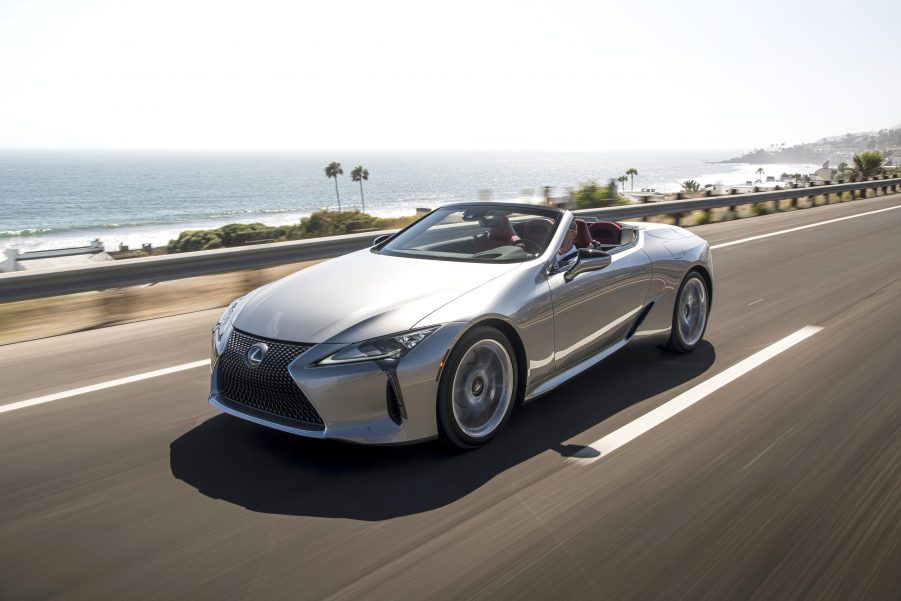 A silver, topless 2021 Lexus LC 500 on a coastal road.