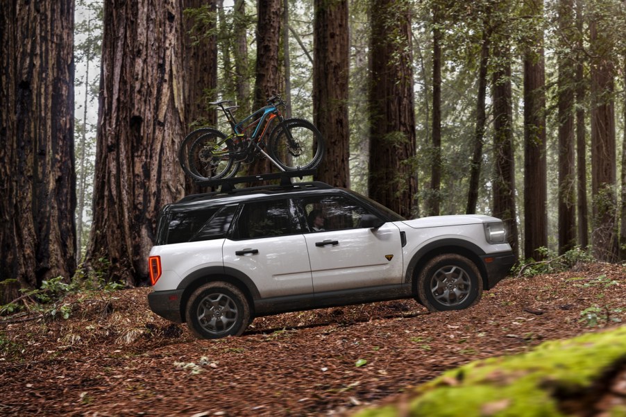 Ford Bronco Sport driving through the woods