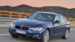 BMW, like this 3 Series driving on a scenic road, is among brands that are leased the most