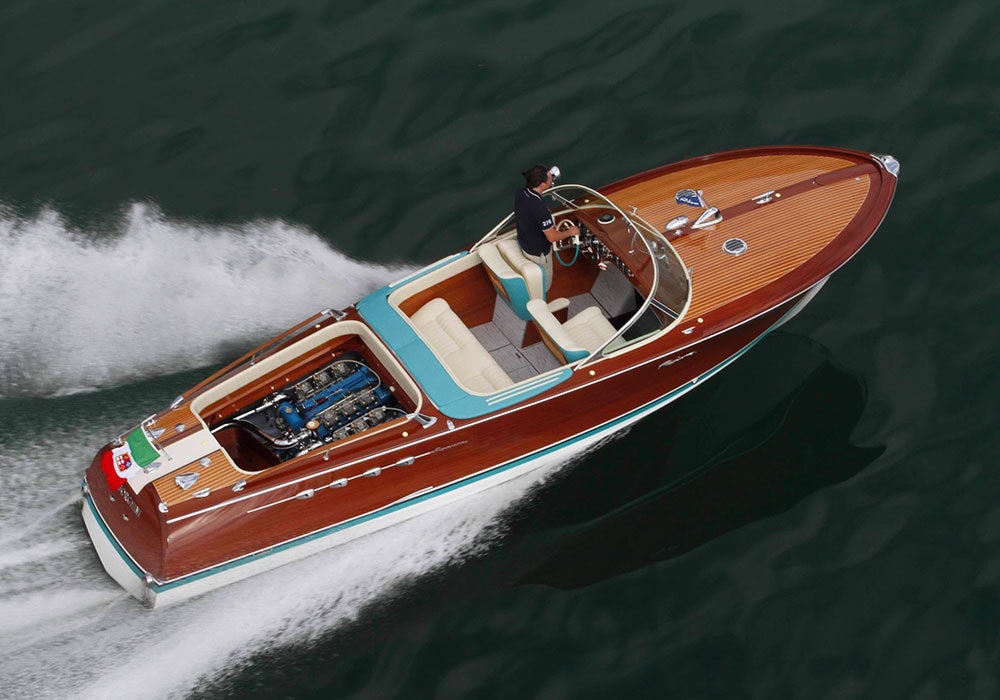 Ferruccio Lamborghini's restored Riva Aquarama yacht speeding through the water