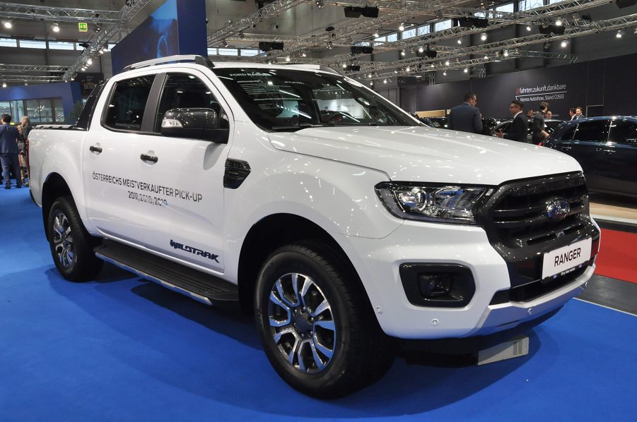 A white 2020 Ford Ranger on display at an auto show