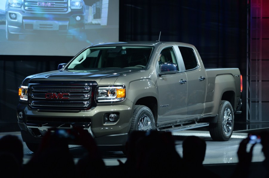 A GMC Canyon truck on display at an auto show