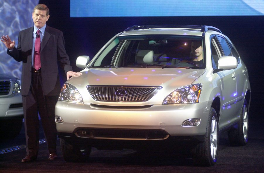 A Lexus RX SUV on display at an auto show