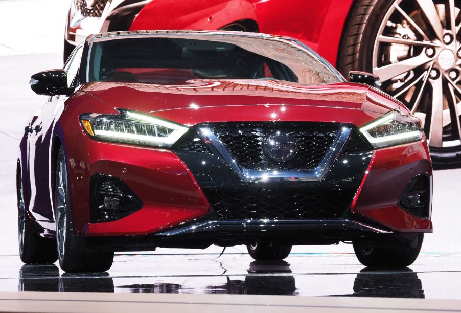 A Nissan Maxima on display at an auto show