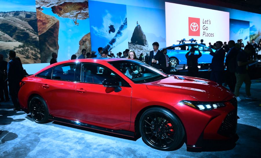 People take a closer look at the new 2019 Toyota Avalon TRD on display in Los Angeles, California