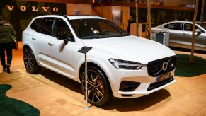 A white 2020 XC60 crossover SUV car on display at Brussels Expo