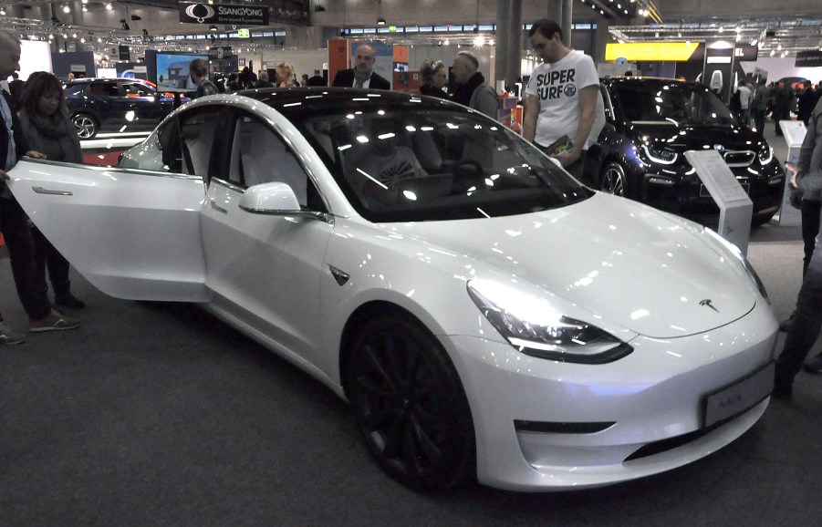 A white 2020 Model 3 is seen during the Vienna Car Show press preview at Messe Wien, as part of Vienna Holiday Fair