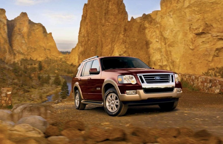 A burgundy Explorer in the desert