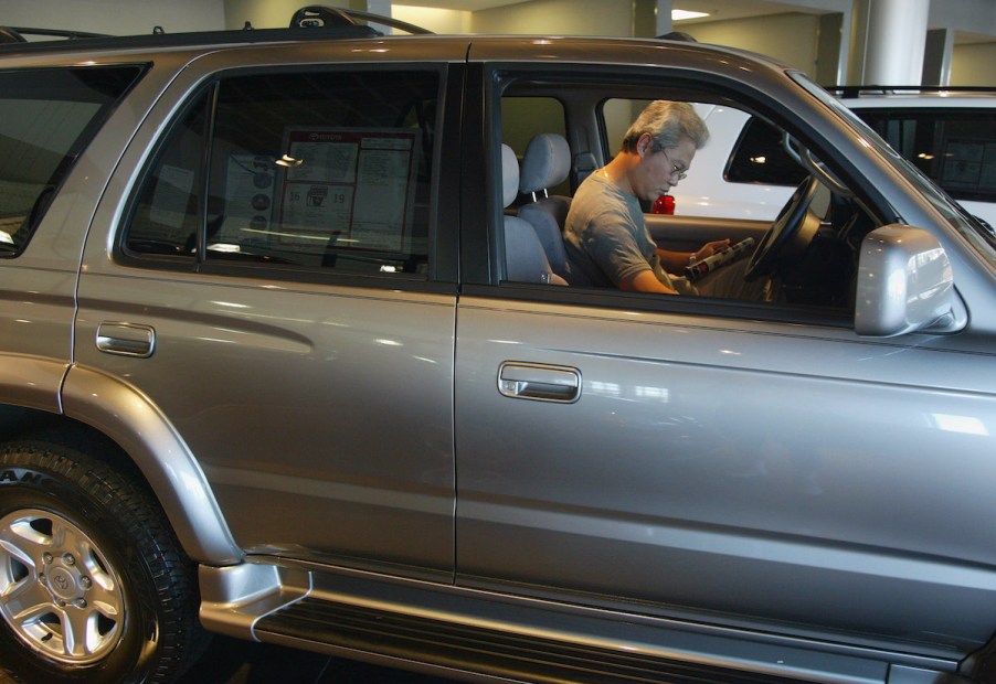 2002 Toyota 4Runner potential new owner taking a look at the driver's side