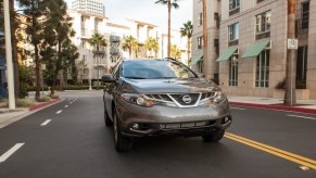 2013 Nissan Murano driving through the city