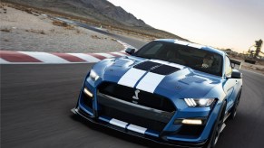 A blue-with-white-stripes 2020 Shelby American Ford Mustang GT500 Special Edition on a racetrack