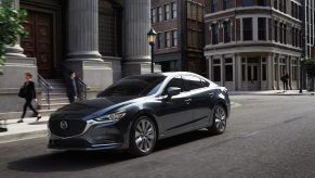 A metallic-gray 2020 Mazda6 in the city