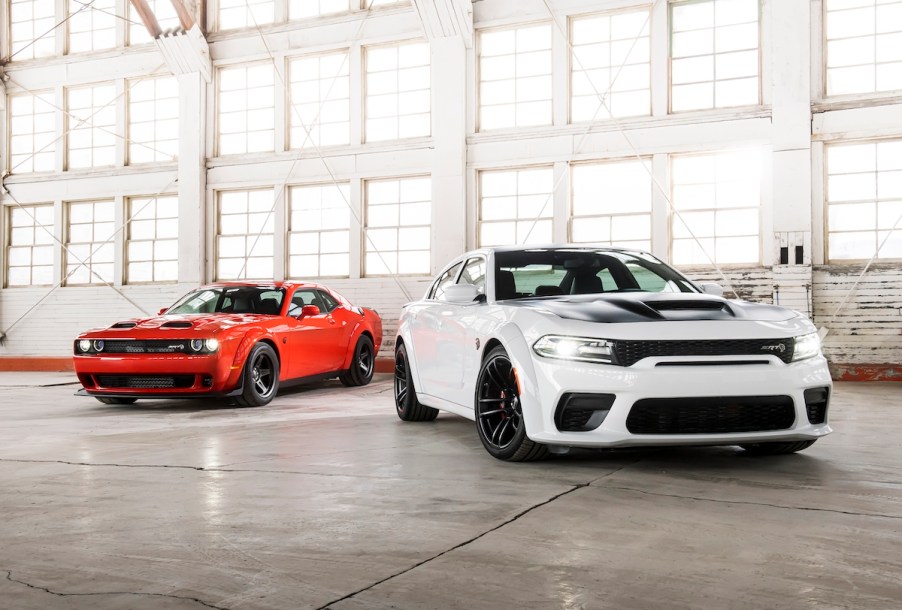 2020 Dodge Challenger and Charger parked in a hangar