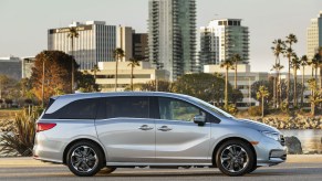 2021 Honda Odyssey parked in front of palm trees