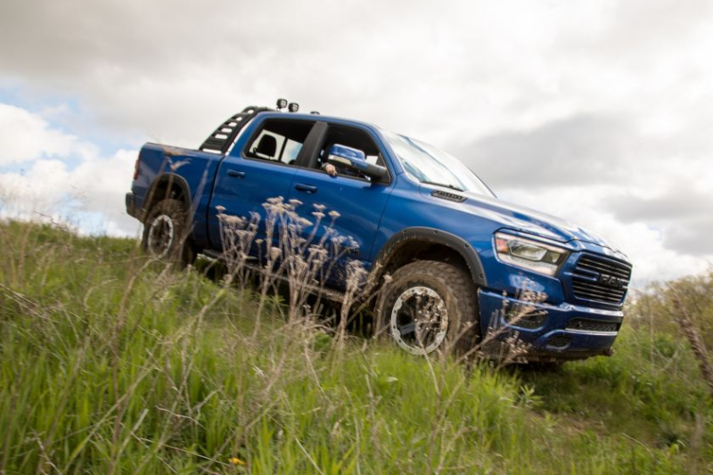 a blue Mopar custom build of an off-road ram 