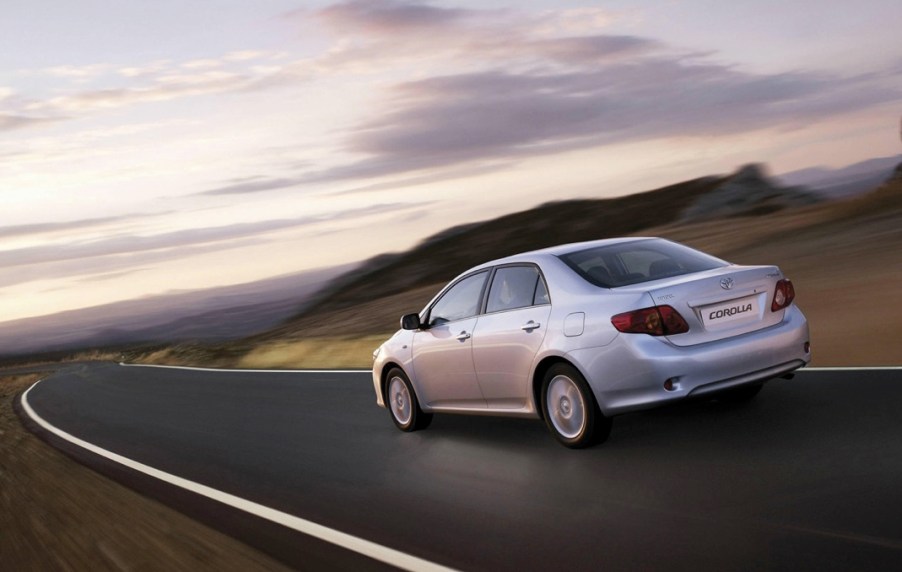 Toyota Corolla 2007 model year rear view driving in the country