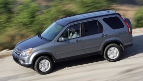 2005 Honda CR-V driving on a gravel road