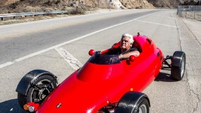 Jay Leno in his Light Car Company Rocket on a California mountain road