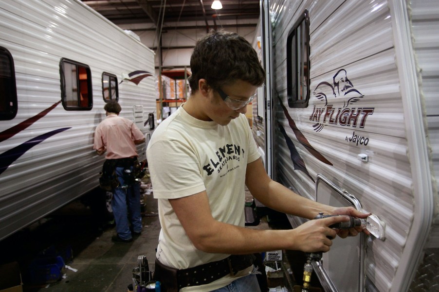 Workers at Jayco, Inc., the country's third largest maker of recreational vehicles, build Jay Flight travel trailers