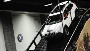 A Jeep Compass on display at an auto show