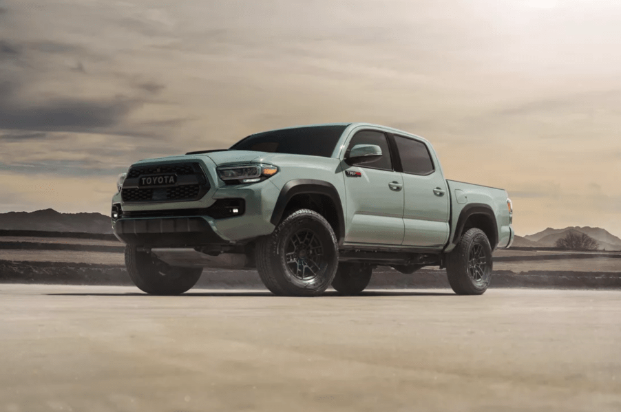 A 2021 Toyota Tacoma parked on sand