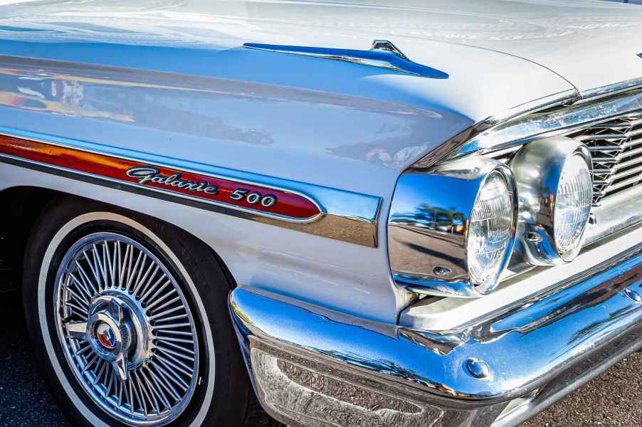 The right front corner of a Ford Galaxie is shown in close up the same car the Manson family used