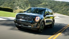 Kia Telluride Nightfall Edition Black driving on road