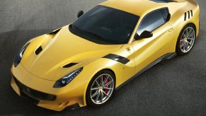 A yellow Ferrari V12 Tour De France edition sports car