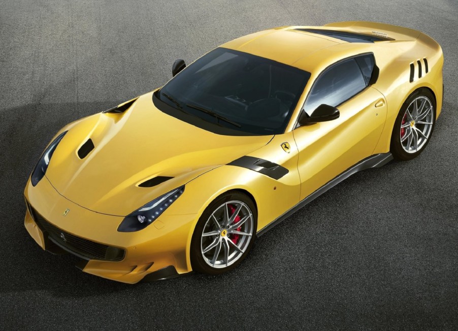 A yellow Ferrari V12 Tour De France edition sports car