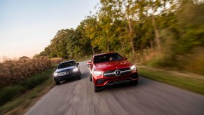 2020 Mercedes-Benz GLC300 driving with another GLC300