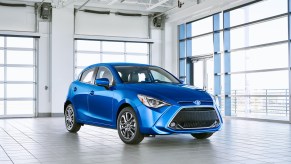 2020 Toyota Yaris parked in a glass panel garage