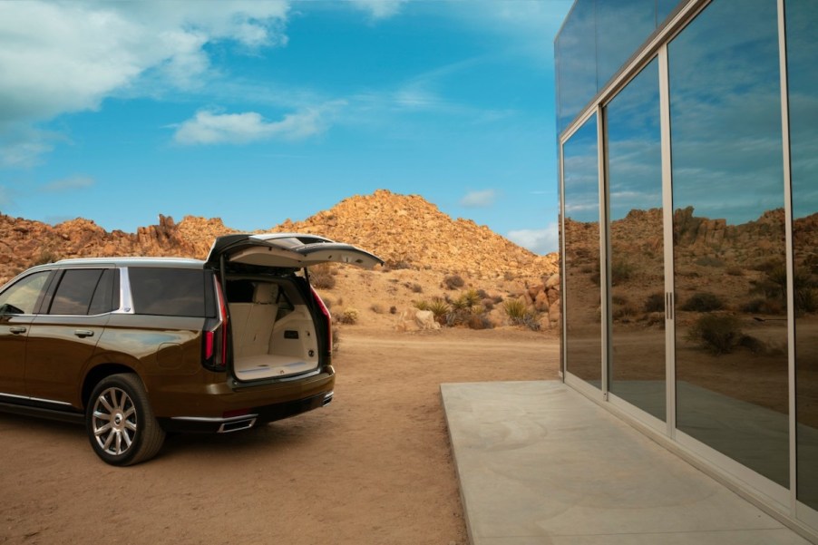 2021 Cadillac Escalade opening up the lift gate and revealing the cargo space