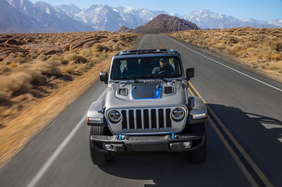 2021 Jeep Wrangler 4xe driving on dessert road