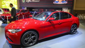 An Alfa Romeo Giulia on display in a showroom