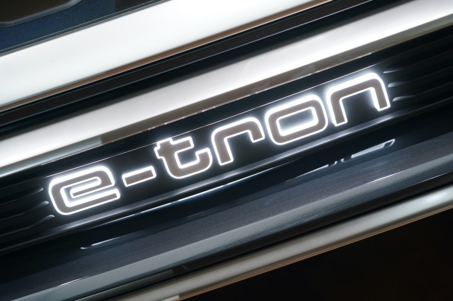 An Audi Q4 e-tron electric car stands on display at a press preview at the Greentech Festival