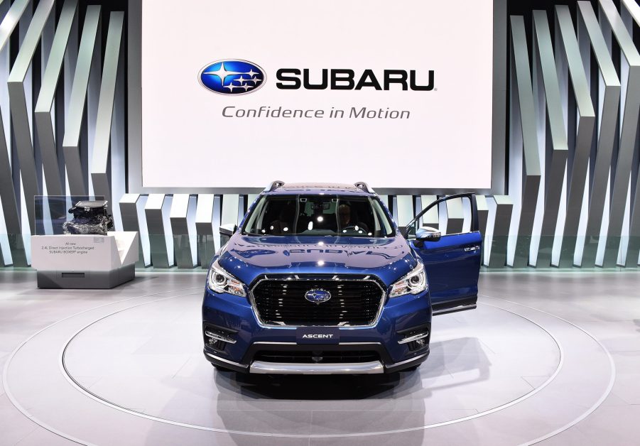 A blue Subaru Ascent on display at an auto show