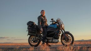 Ewan McGregor on his blue Harley-Davidson LiveWire modified for Long Way Up