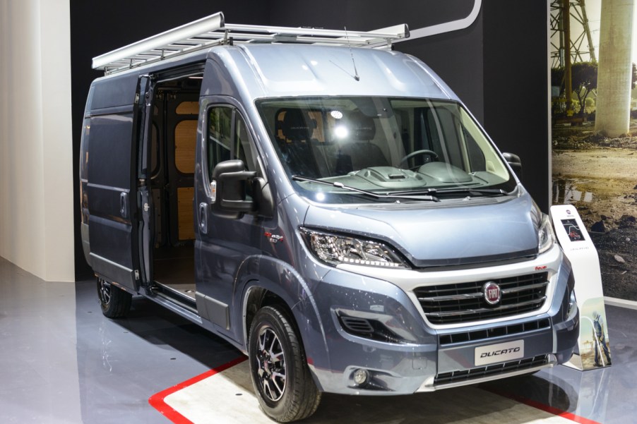 A Fiat Ducato panel van on display at an auto show