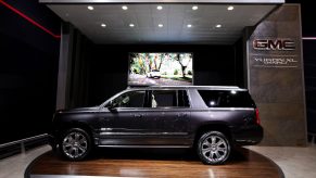 A GMC Yukon XL Denali on display at an auto show