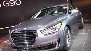 A Genesis G90 on display at an auto show