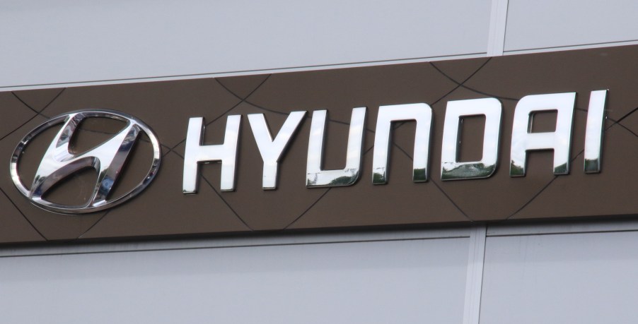 Hyundai motor company logo seen at a car dealership