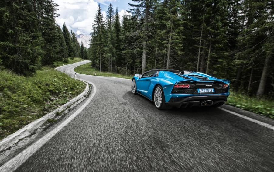 Lamborghini Aventador driving through the forest