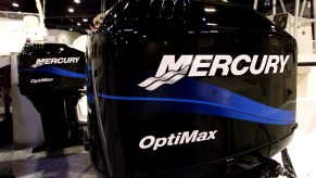 Mercury outboard motors on display at a boat show