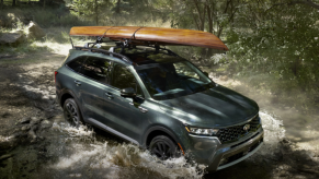 2021 Kia Sorento driving through a stream